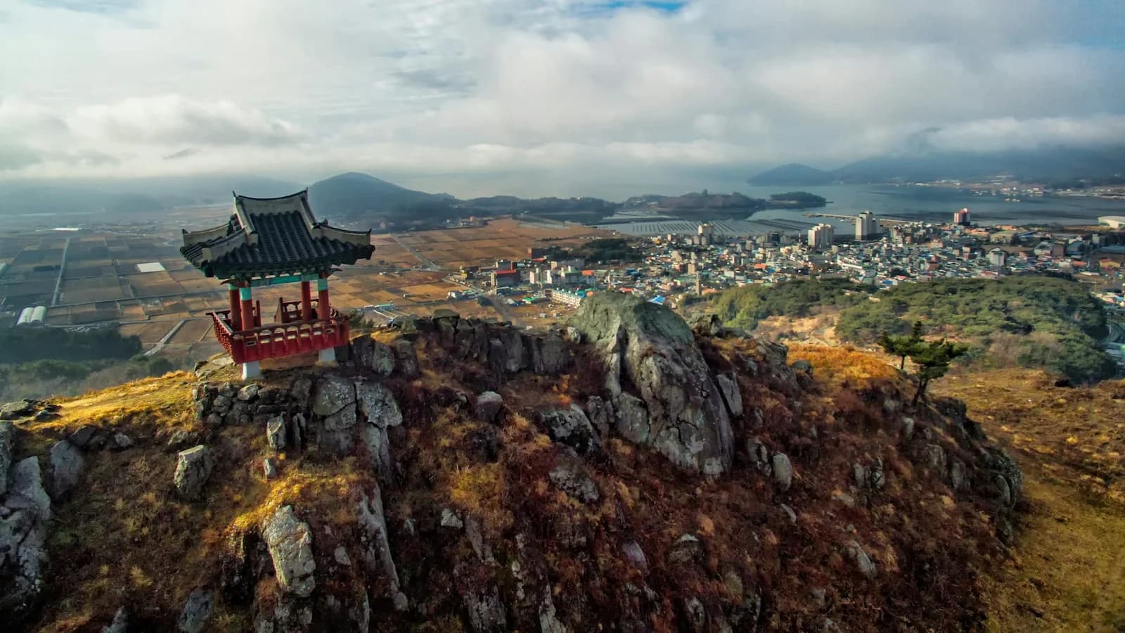 Scenic view from Geoje Island overlooking the coastline and city, site of the historic Geoje POW Camp during the Korean War, visited on Essential History Expeditions’ Essential Korea tour.