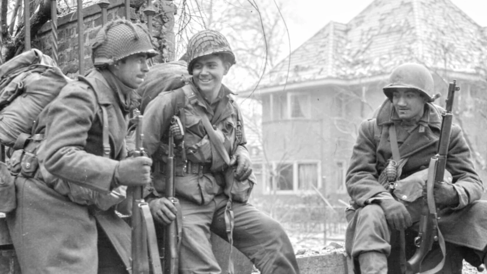 U.S. soldiers taking a break in snowy Malmedy, Belgium during the Battle of the Bulge, 1944. Malmedy is a key stop on our 85th Anniversary Battle of the Bulge tour.