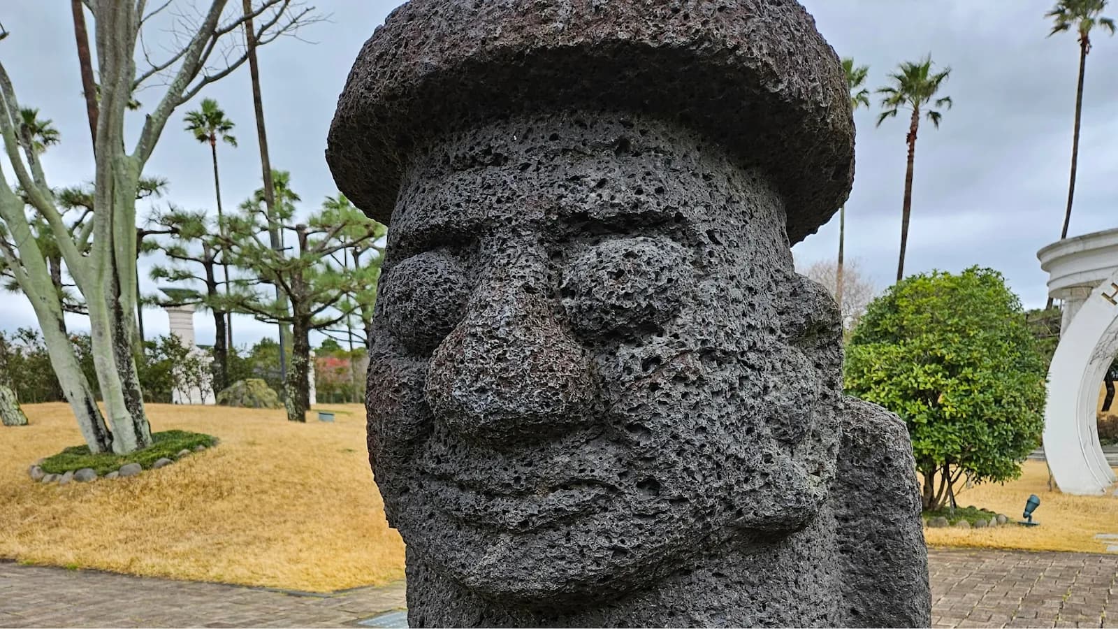 Traditional Jeju stone grandfather statue (Harubang), one of the island’s most recognizable cultural symbols carved from volcanic rock, featured on Essential History Expeditions’ Jeju extension.