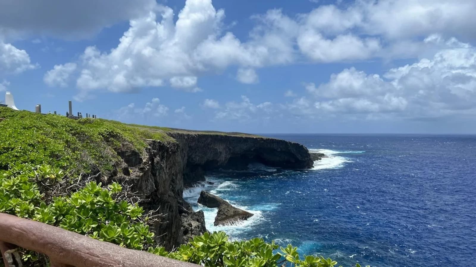 Dramatic cliffs at Banzai Cliff on Saipan, site of the final Japanese defense and mass suicides during the 1944 Battle of Saipan on Essential History Expeditions’ Pacific WWII tour.