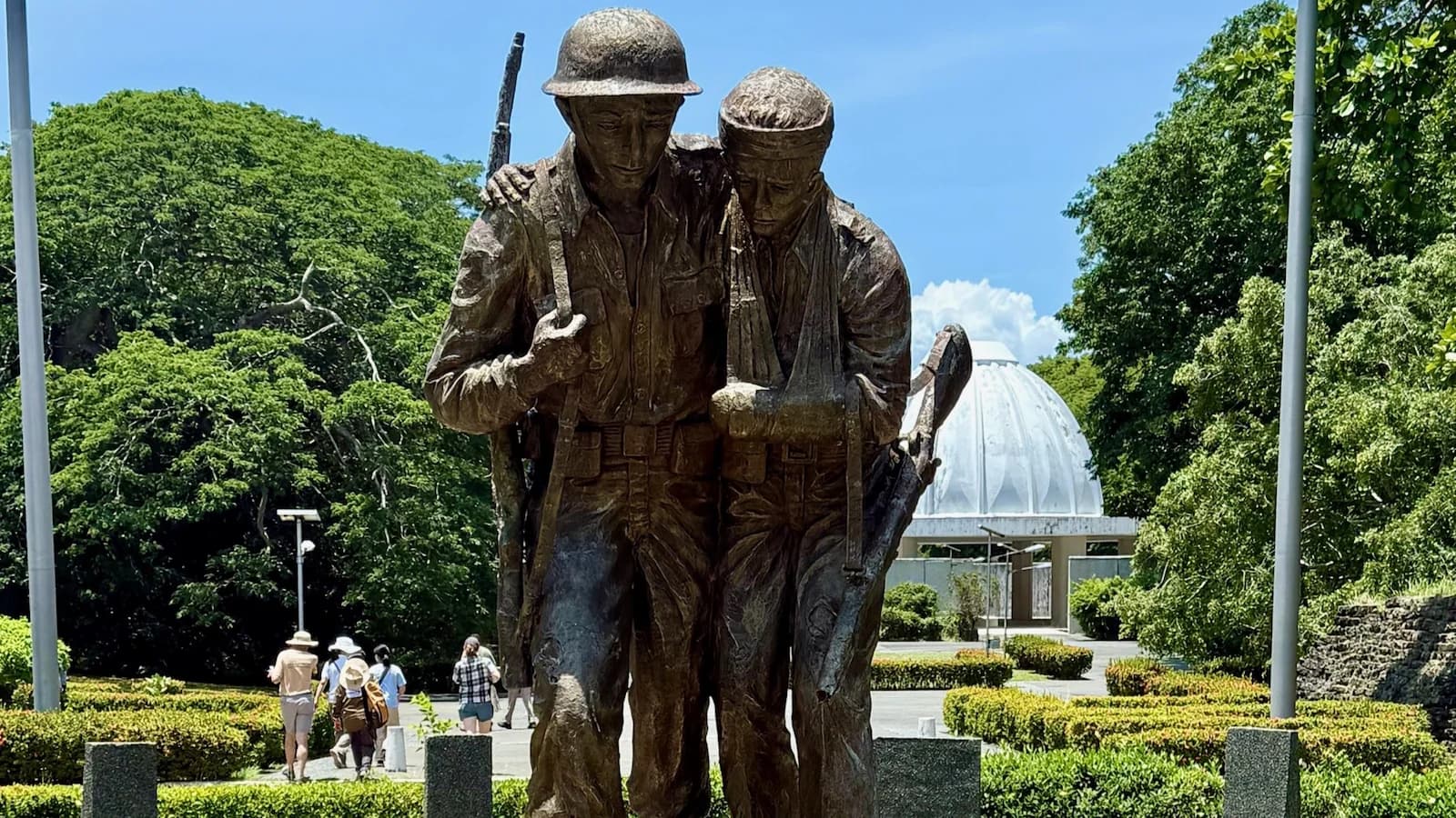 Bronze memorial statue of American soldiers on Corregidor Island, honoring the defenders of 1942 and liberators of 1945 during Essential History Expeditions’ Pacific WWII tour.