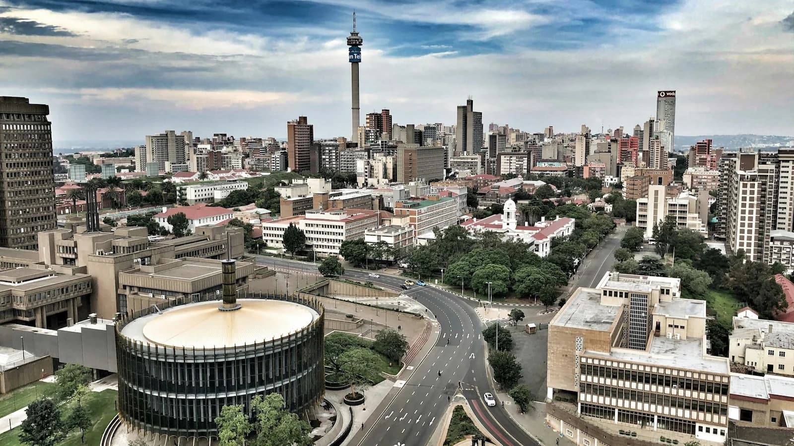 Panoramic view of Johannesburg skyline, South Africa’s largest city and gateway to this history and safari tour exploring Nelson Mandela’s legacy and the Rainbow Nation.