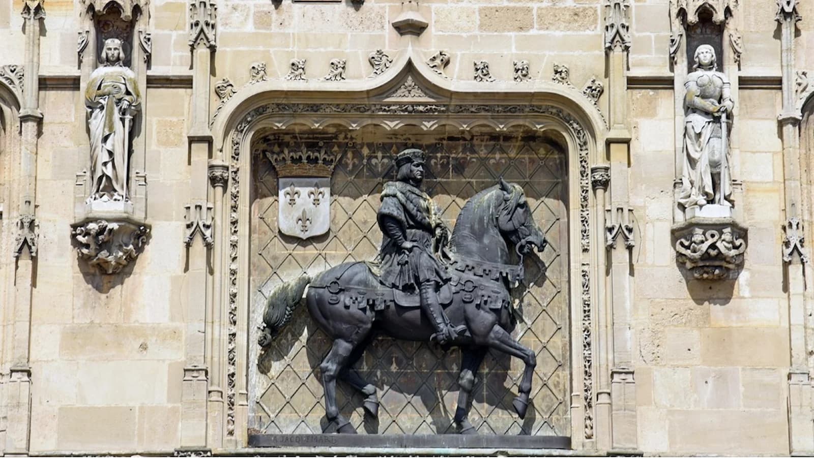 Bronze equestrian relief of King Louis XII on the facade of Compiègne Town Hall, France, visited at the conclusion of Essential History Expeditions’ World War I tour of the Western Front.