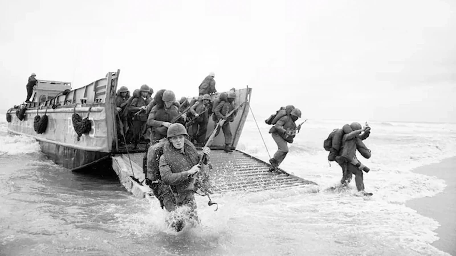 Iconic black-and-white image of American Marines wading ashore at Red Beach, Da Nang, during Operation Rolling Thunder in 1965. This powerful landing site is explored during our Essential Vietnam: History & Culture journey.