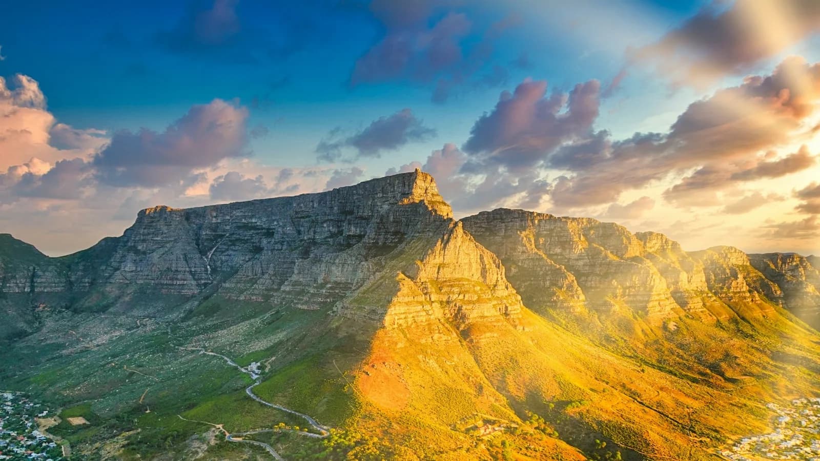Breathtaking golden hour light on Table Mountain, one of Cape Town’s most iconic natural landmarks visited during the tour.